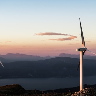 two white wind turbines