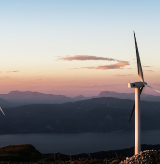 two white wind turbines