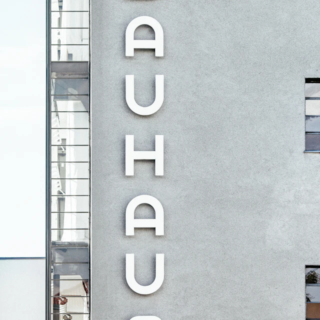 Bauhaus style concrete apartment building with balconies