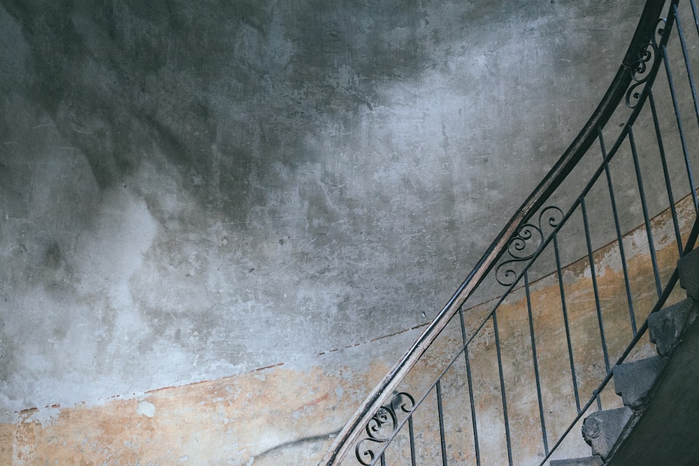 grey metal handrail on staircase