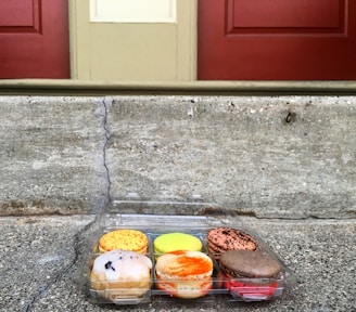 A delivery box filled with assorted treats sitting on a doorstep in Annandale, Virginia.