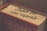A close-up of a book with the words 'From the real experts' written on the spine. The book has a warm color palette with hints of red and beige, and is titled 'The Ultimate Insiders' Guide' with parts of the title obscured.