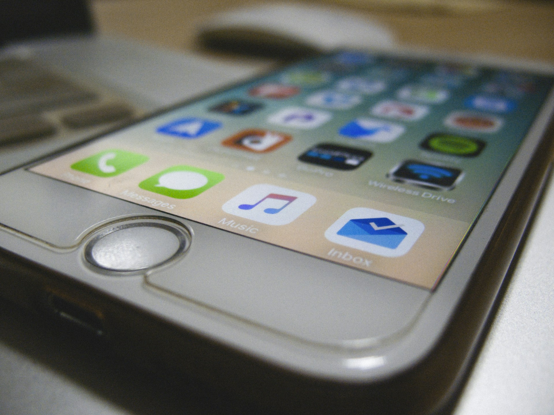 Close-up of a smartphone displaying a colorful, playful app screen.