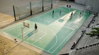 aerial photo of people at basketball court