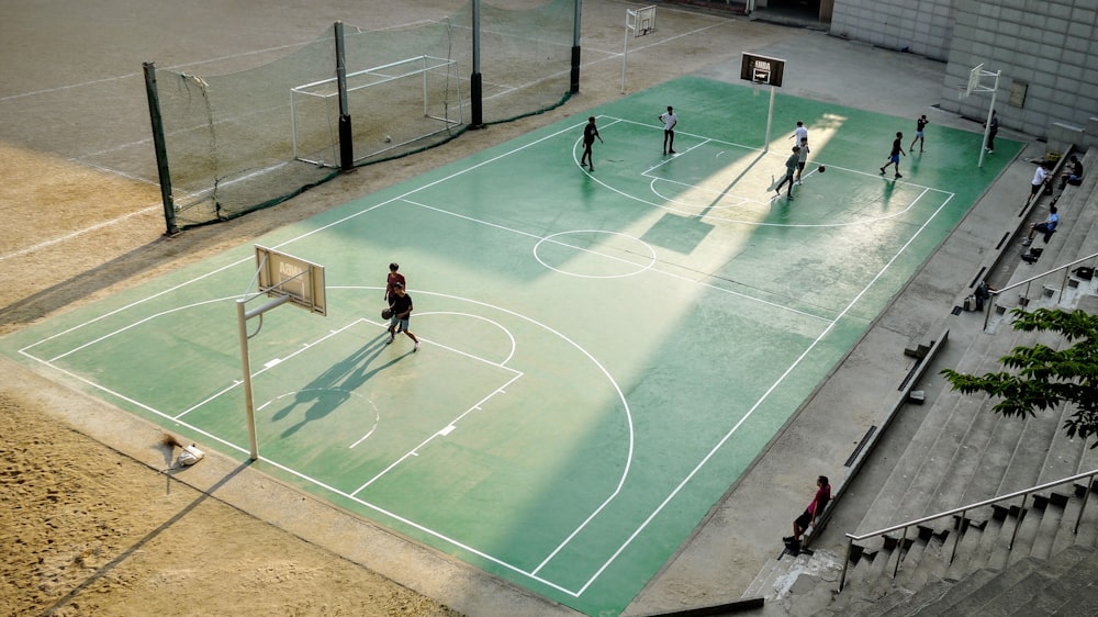 aerial photo of people at basketball court