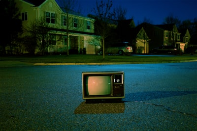 turned off vintage crt television on road retro google meet background