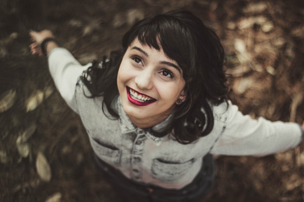 women wearing grey denim jacket close-up photography