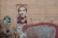 A wall with urban graffiti and street art. There is a detailed portrait of a man painted on a rectangular section of the wall. To the left, a street sign reads 'Strada Arthur Verona'. Surrounding the portrait are various graffiti tags and colorful patterns. The overall aesthetic is gritty and artistic.