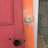 Close-up of a repaired wooden door frame with fresh paint.