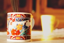 Close-up of a beautifully printed photo mug with a smiling family picture.