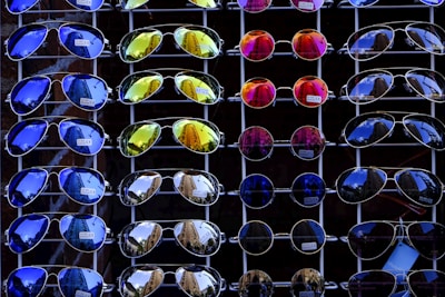 photo of assorted-color-and-design sunglasses lot