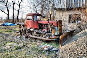 Snappin Boltz mobile workshop van parked next to a broken-down bulldozer.