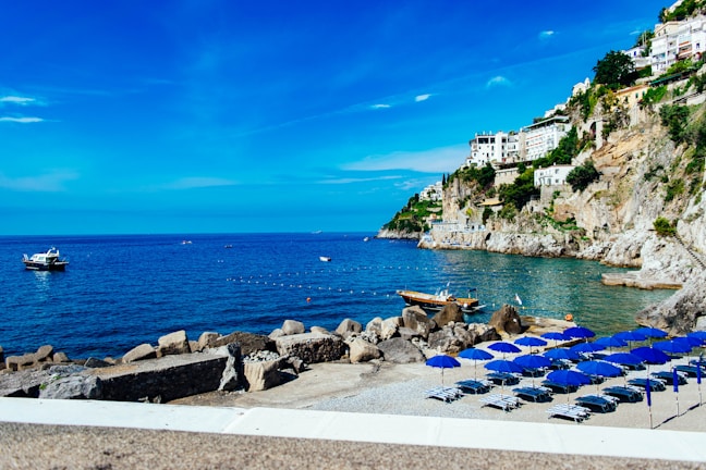 A beautiful beach in Greece with clear blue waters.