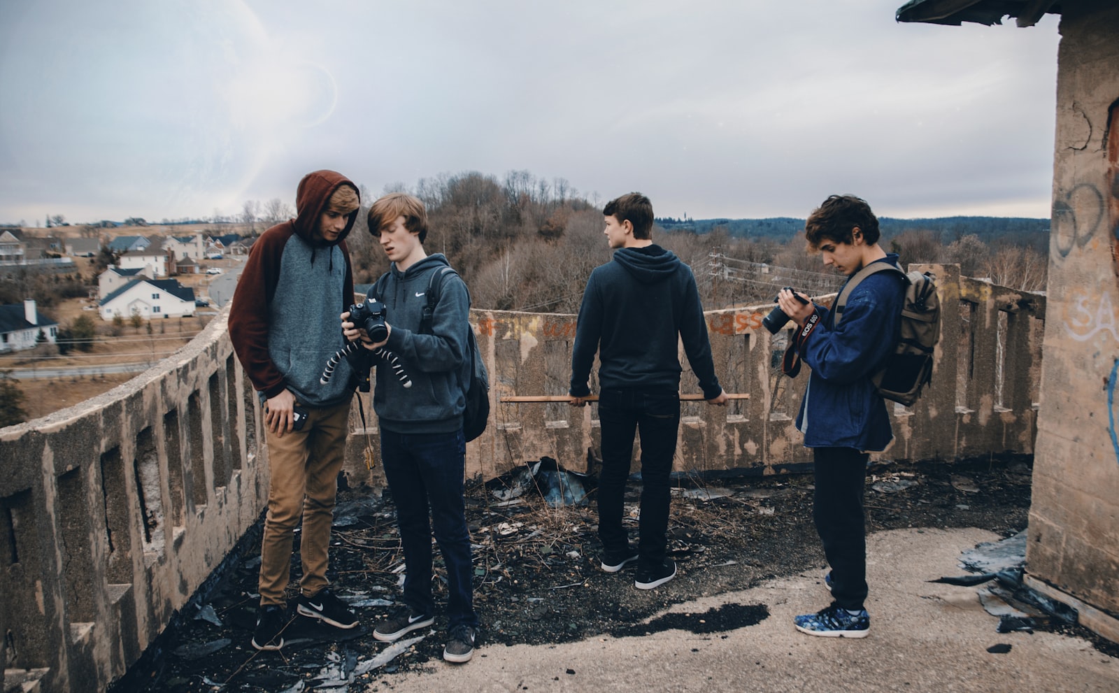 Nikon D5100 + Tamron 18-270mm F3.5-6.3 Di II VC PZD sample photo. Four man wearing blue photography