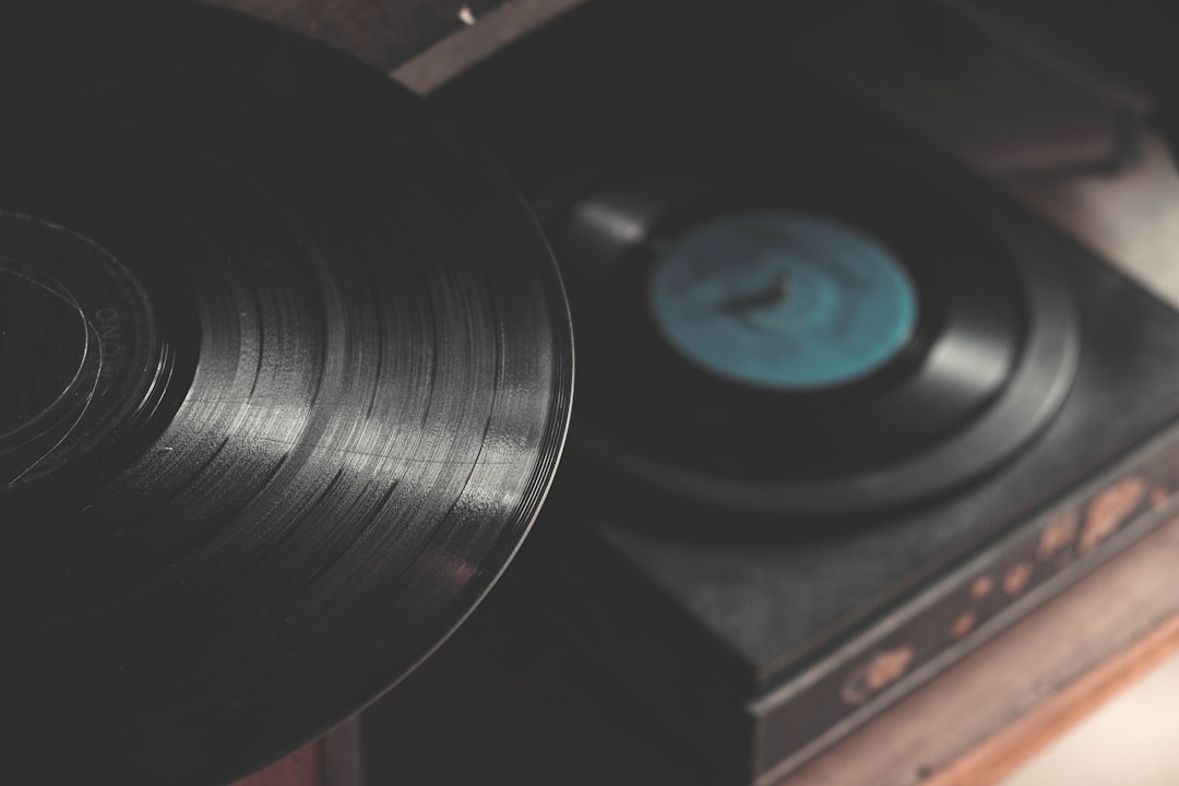 black portable vinyl records, Top view of a turntable