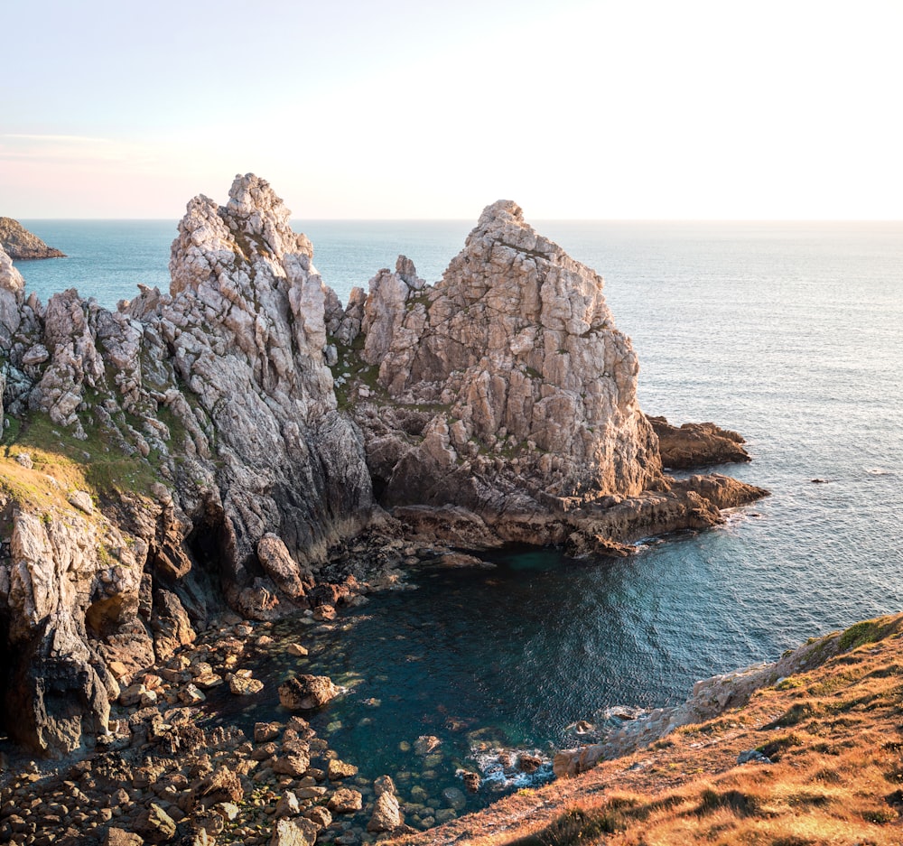 rock formation near body of water