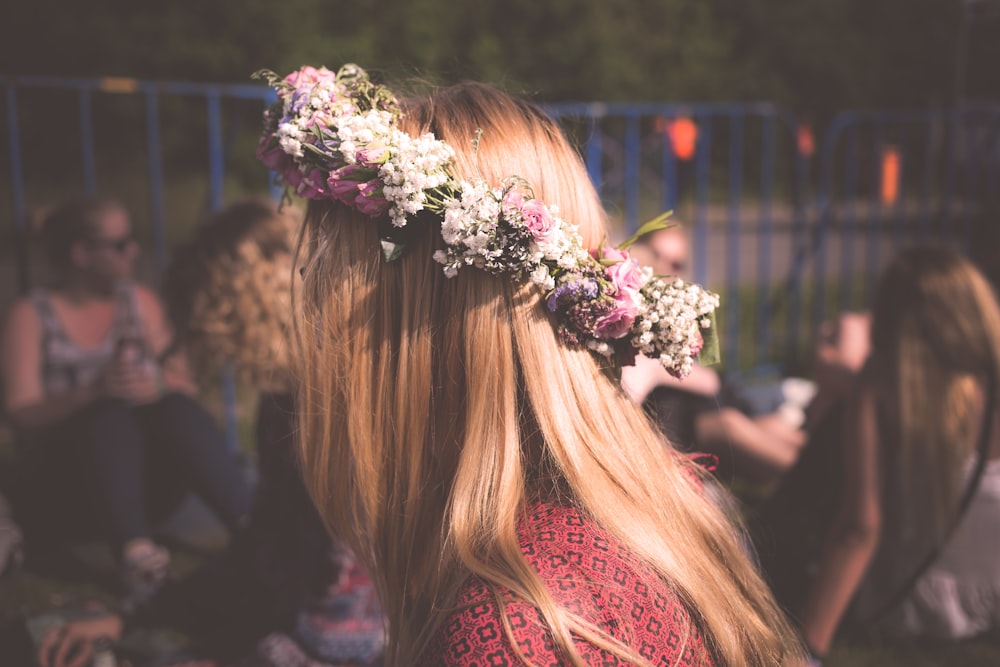 woman wearing floral accent top