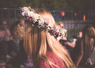 woman wearing floral accent top