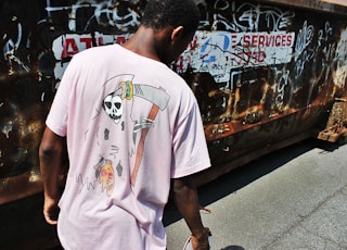 man wearing pink crew-neck shirt