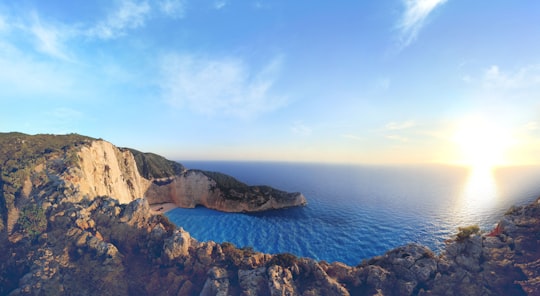 sea water surrounded by cliff in NAVAGIO Greece