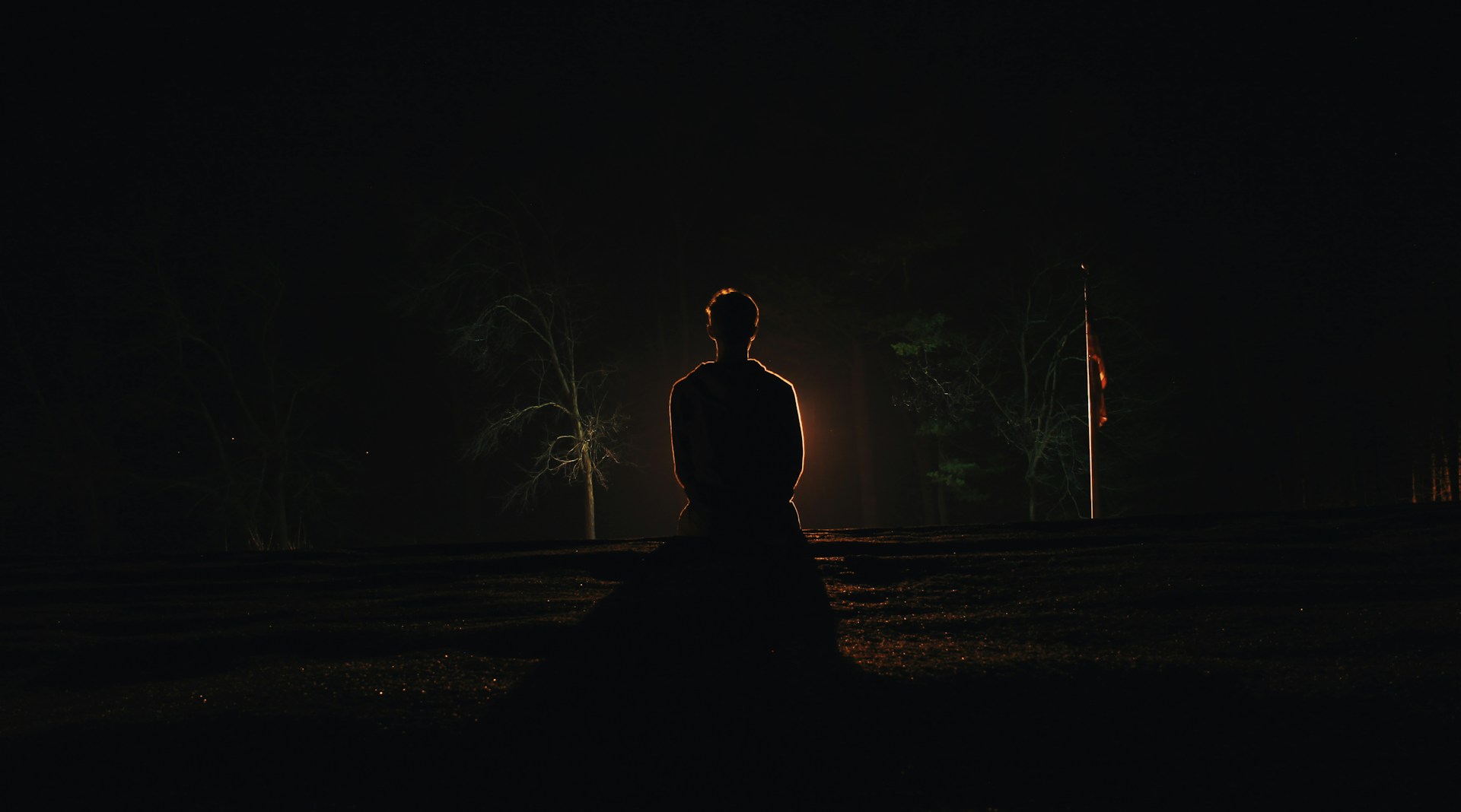 woman wearing yellow long-sleeved dress under white clouds and blue sky during daytime