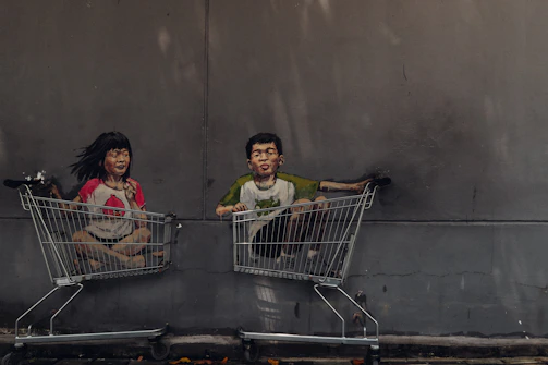 Children playing joyfully near a mural painted with the colors and spirit of La Voz de Jenny in Jalisco.
