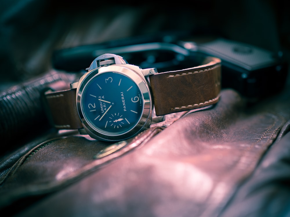 selective-focus photography of black chronograph watch