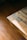 A close-up of the product on a wooden table with natural light.