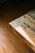 Close-up of a handcrafted wooden table showcasing natural grain and epoxy resin details.