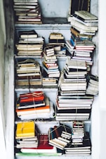 closeup photo of assorted-color book lot