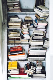 closeup photo of assorted-color book lot