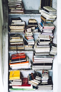 closeup photo of assorted-color book lot