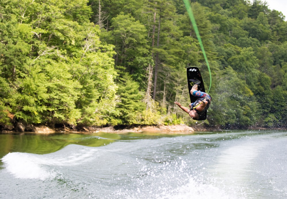 person using water ski during daytime