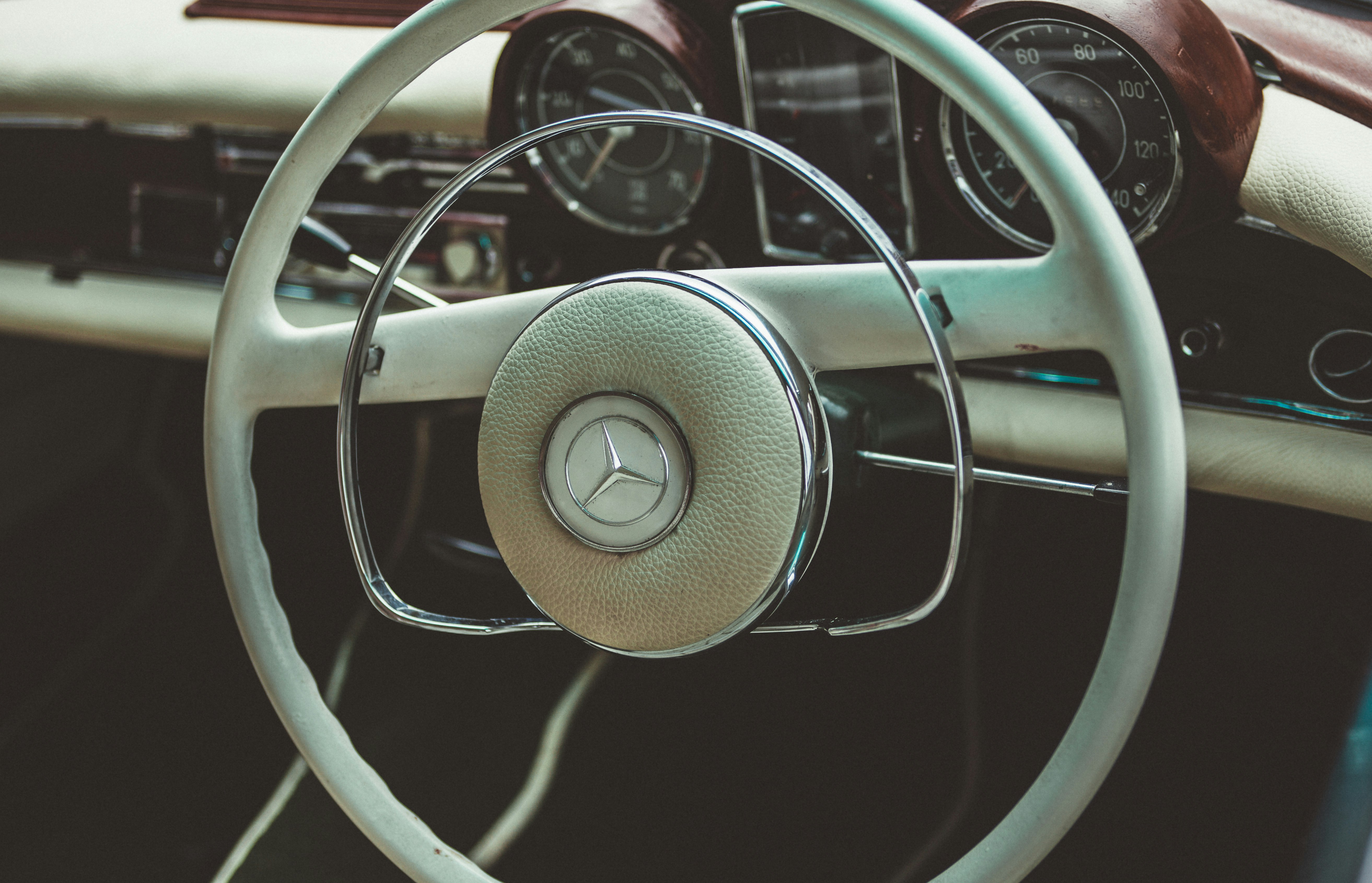 teal Mercedes-Benz vehicle steering wheel