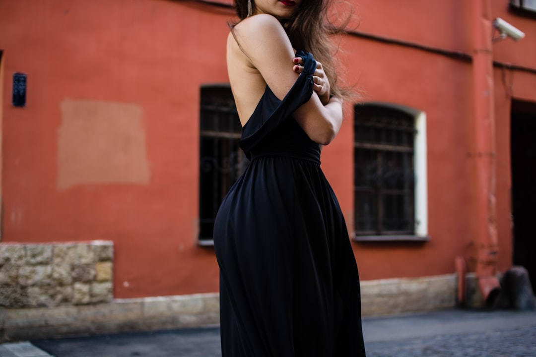 woman standing with cross arm