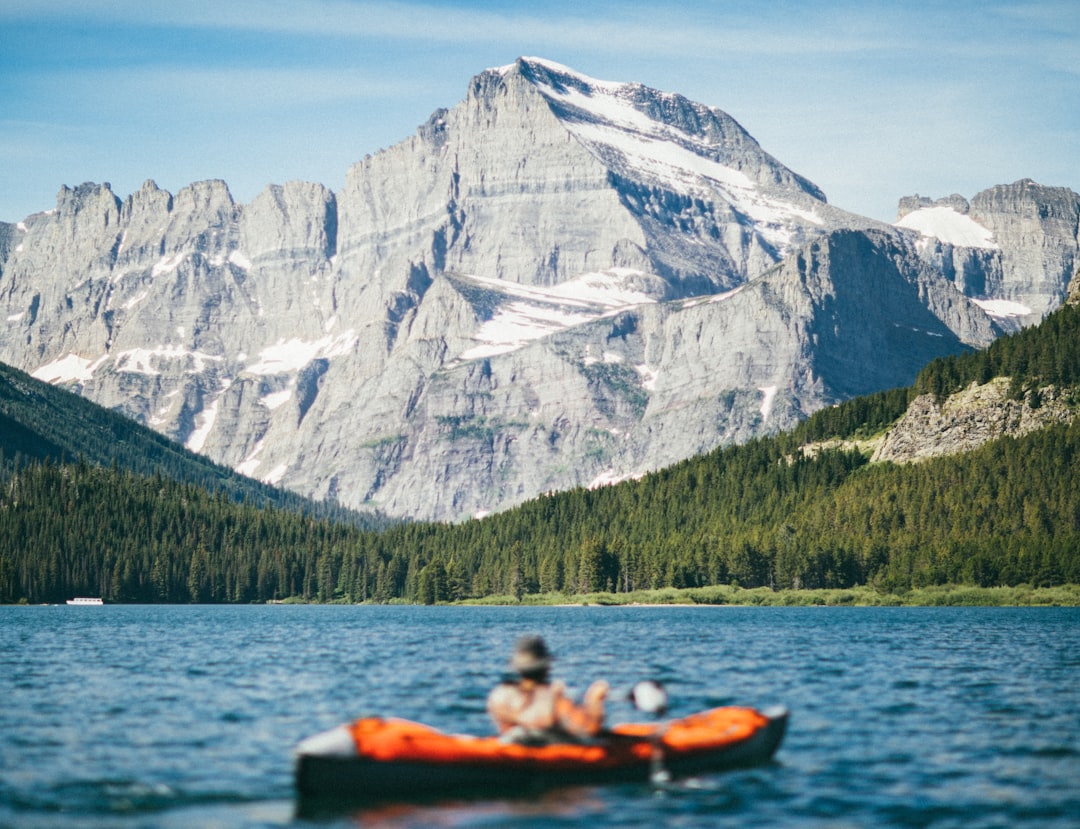 Mountain range photo spot Swiftcurrent Lake United States