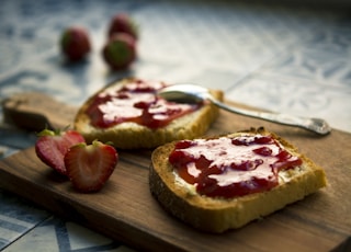 photo of bread with strawberry jam