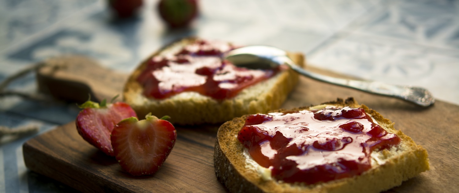 photo of bread with strawberry jam