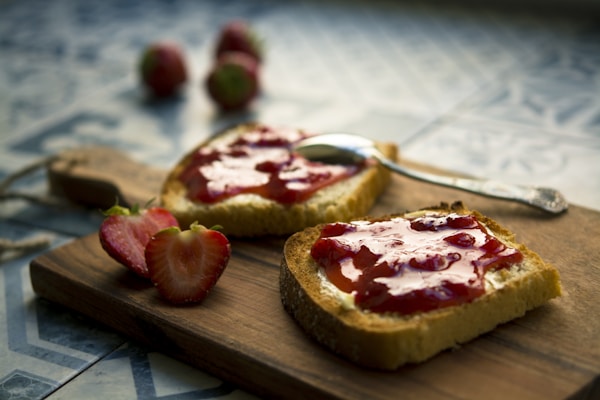 Photo of bread with strawberry jam