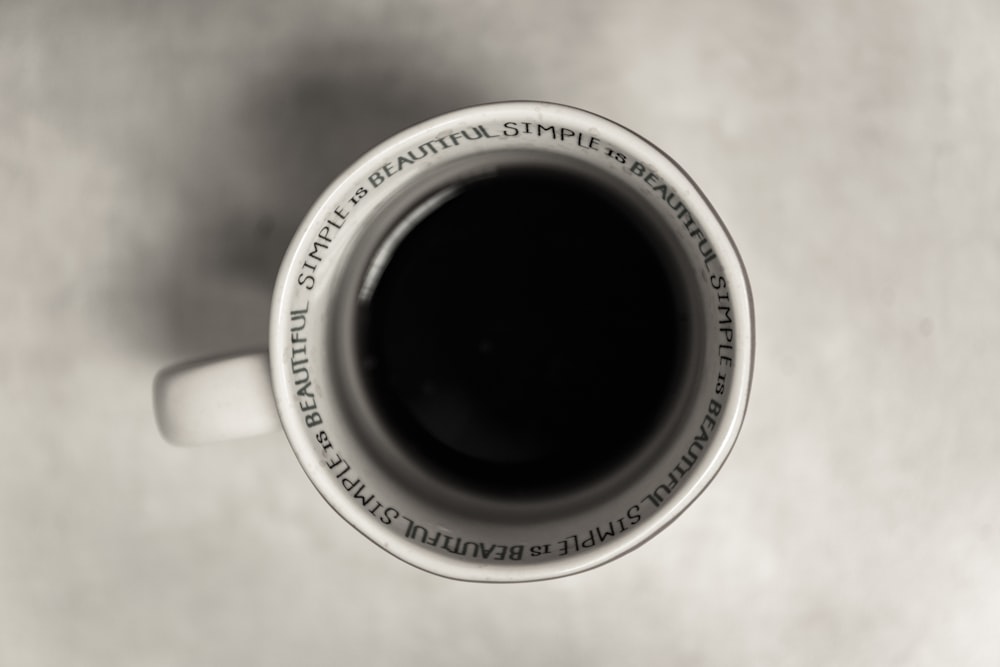 Black coffee in white simple is beautiful cup on white table from above, Chicago