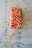 focus photography of drumstick ice cream with toppings