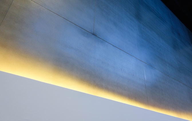 Minimalist blue-themed electrical installation in a modern home interior.