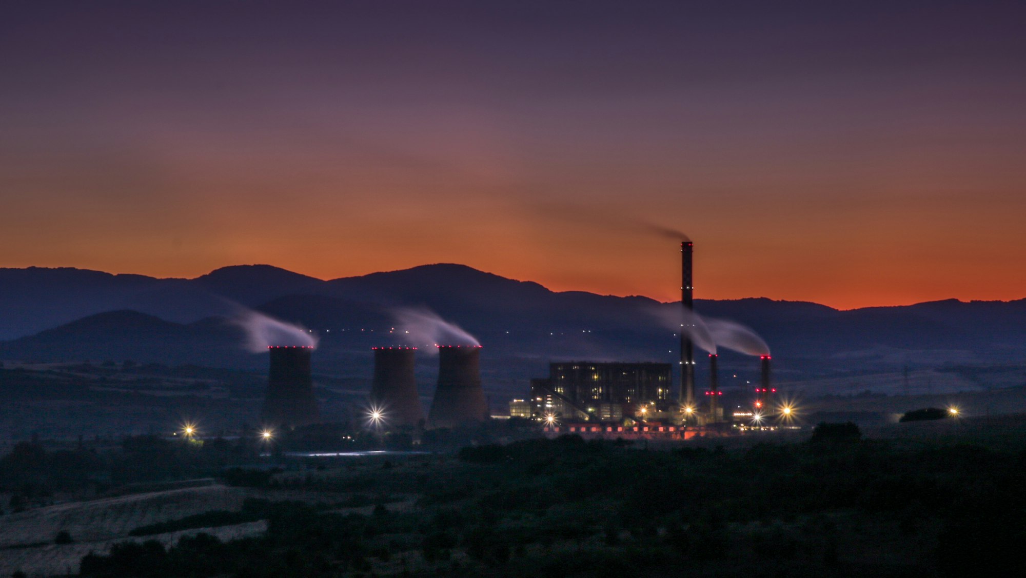 Sunset above power plant