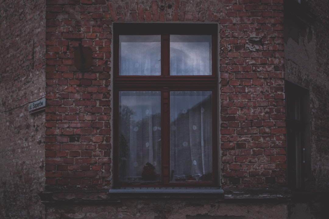 brown framed glass windowpane