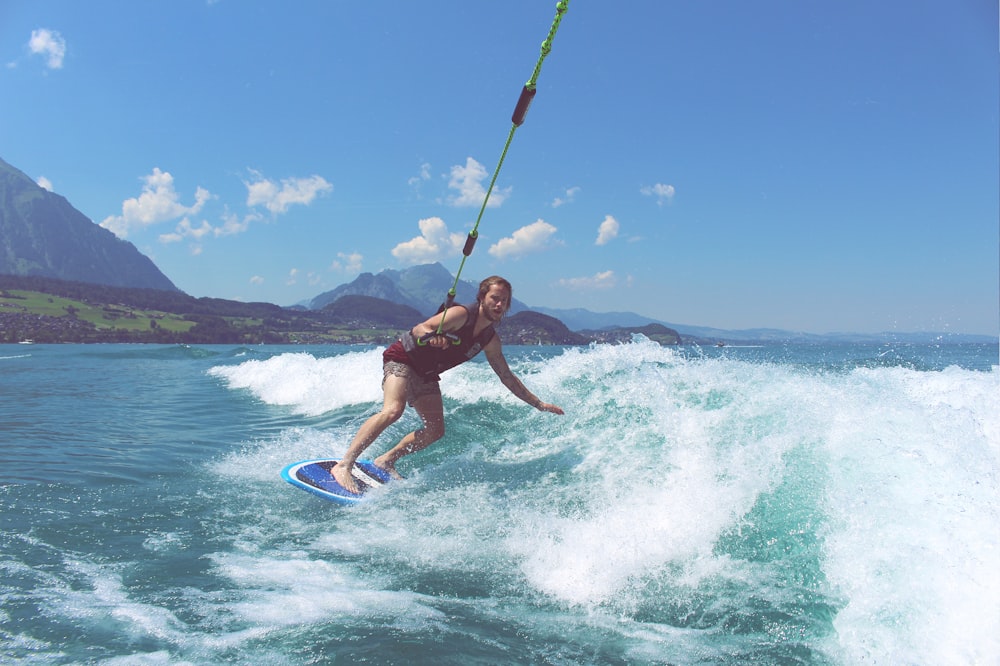 person surfing on seashore