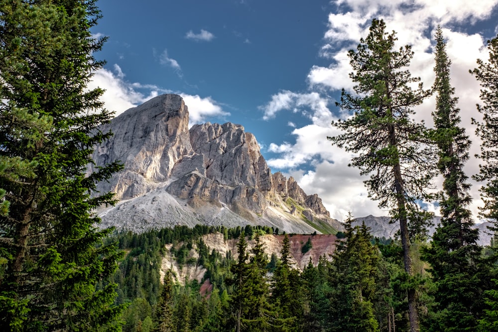 aerial view photography of rock mountain under blue skyt