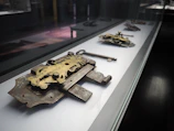 A row of sturdy locks lined up on a wooden display, highlighting precise craftsmanship.