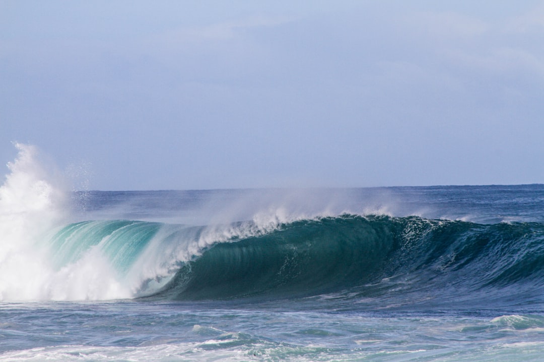 sea wave under gray clouds at daytime, Sea spray and waves