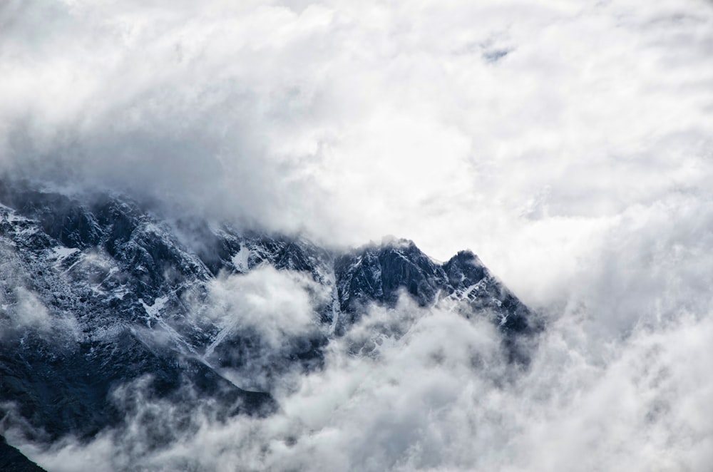 Cold clouds cover Caucasus Mountains on a foggy winter day