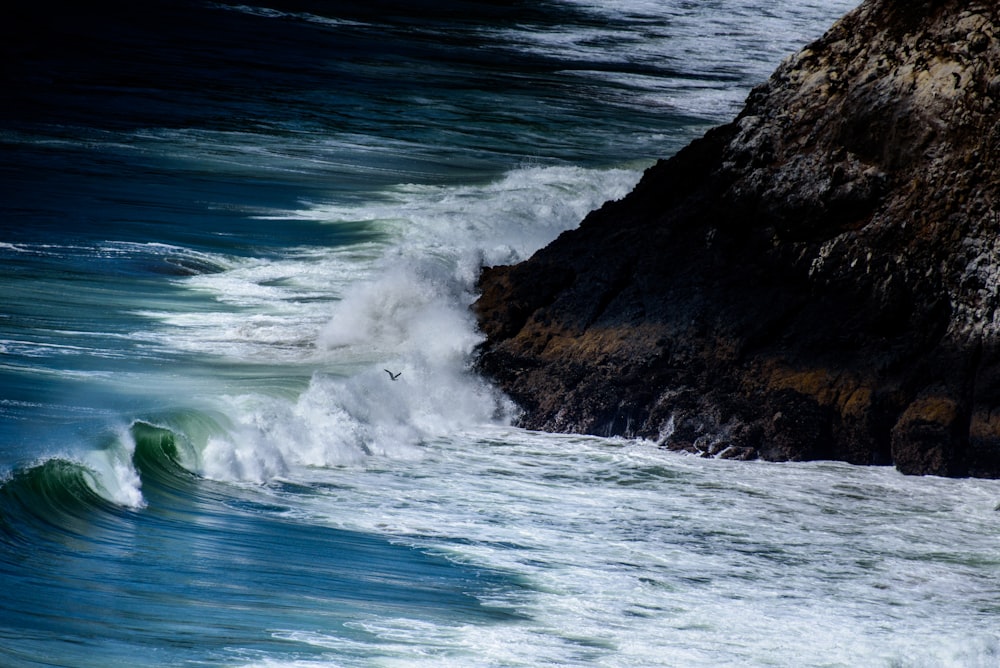 wave of sea on rock